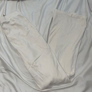 Cream colored velvet bootleg sweatpants